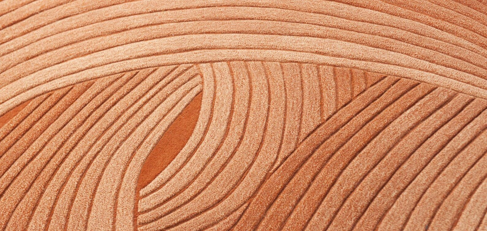 close orange desert wool rug